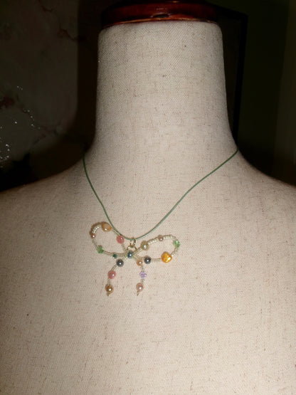 White Bejeweled Bow Necklace- Green Rope